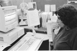 social worker Sharon Levitt staring at the computer in frustration