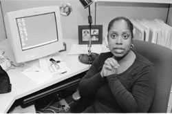 Alisa Willaims sitting at her desk