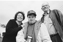 Community worker for the people with  disablities, Maria  with a family she helps. 
