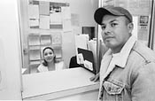 Luis at receptionist window