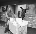 Matt McGinley  with James and his shoping cart infront of his room at a hotel