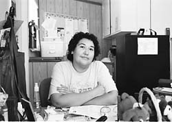 Vickie at her desk