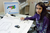 high school intern at drafting table
