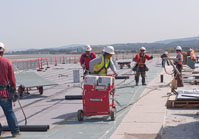 roofers working together