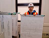 High shool intern wearing hard hat