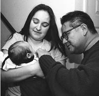 Social Worker Jacob Ocampo with a family